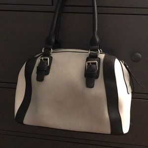 Black, white, and gray charming Charlie’s bag